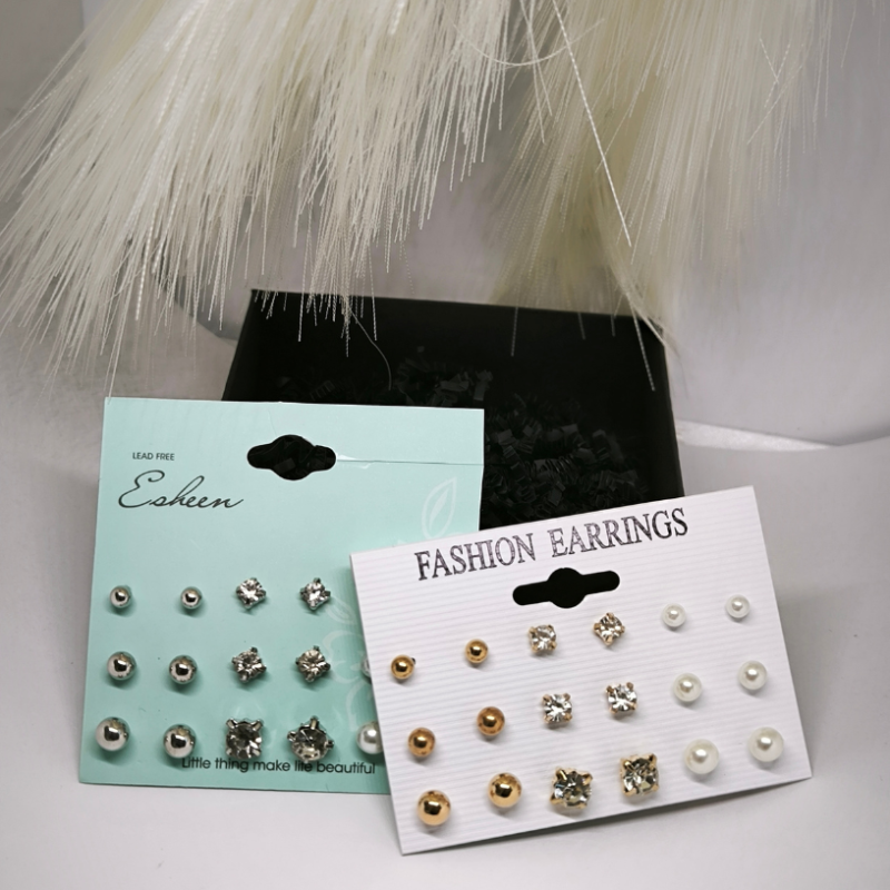 Stilīgu pērļu un kristālu imitācijas auskaru komplekts