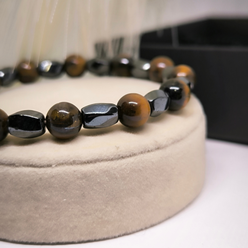 Hematīta rokassprādze ar tīģera aci