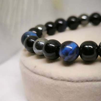 Obsidiāna akmens krelles rokassprādze ar tīģera aci