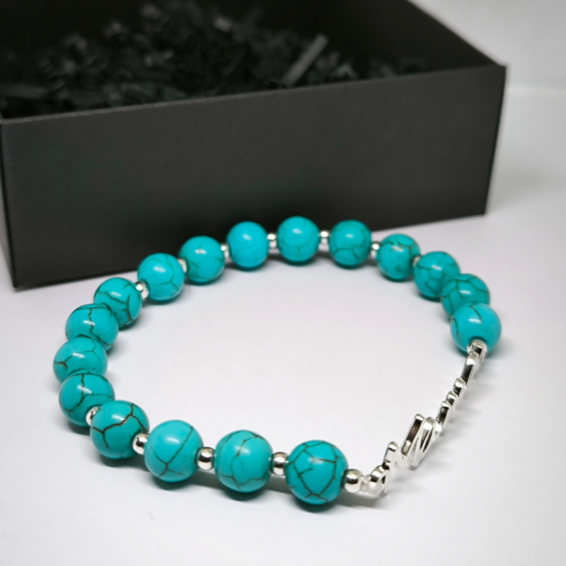 Rokassprādze "Mama" ar tirkīza akmeņiem, roku darbs