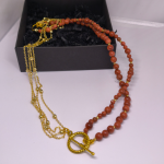 Roku darināta kaklarota „Zelta ausma“