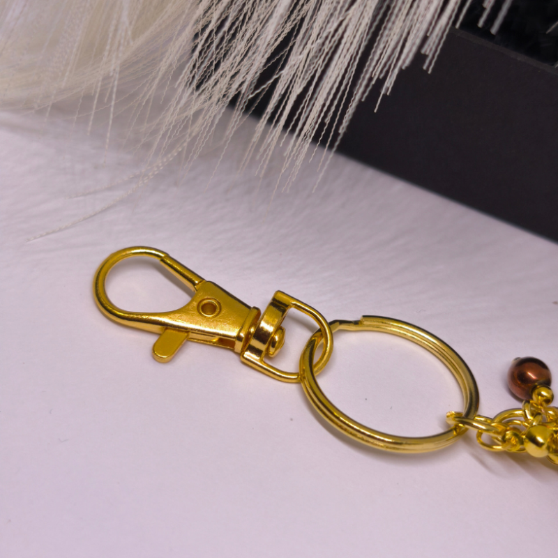 Roku darbs somas un atslēgu piekariņš "Lācītis"