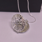 Medaljons „Laika rats“