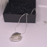 Medaljons „Klusā sajūta“